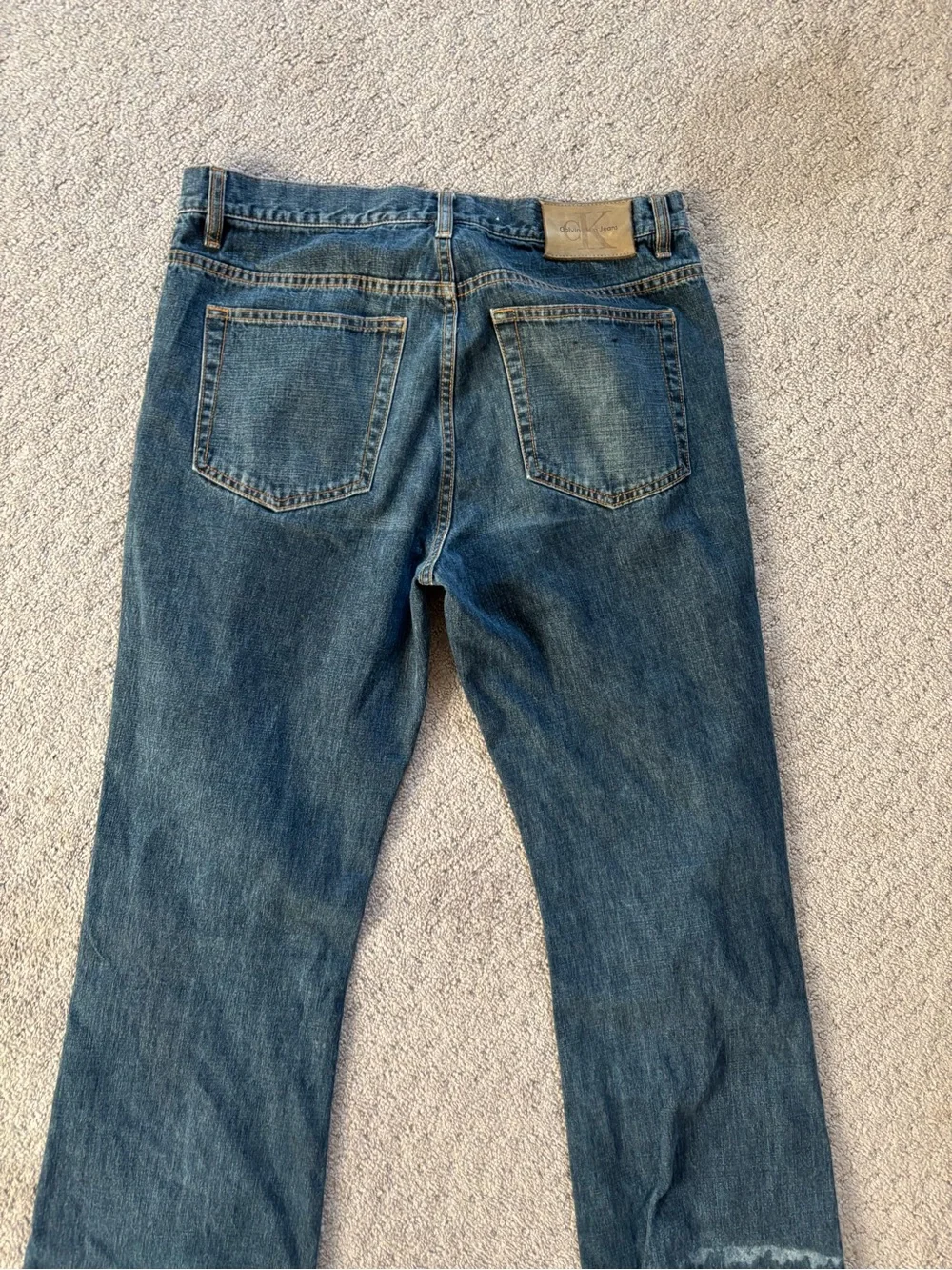 Calvin Klein Men's Faded Blue Straight Jeans